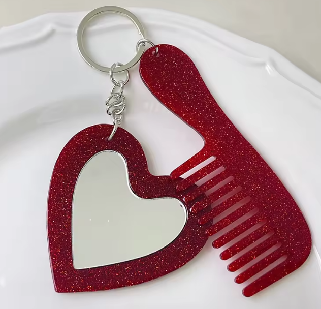 Free red glitter heart mirror and comb keychain for the first 50 Amore orders